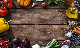 rustic wooden plank with fresh organic vegetables