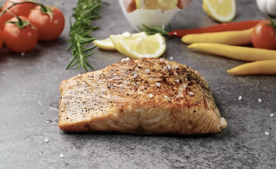 salmon being seasoned