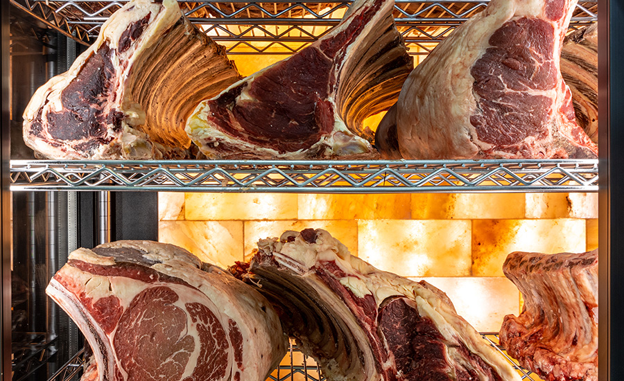 Beef steak in dry aged meat aging cabinet