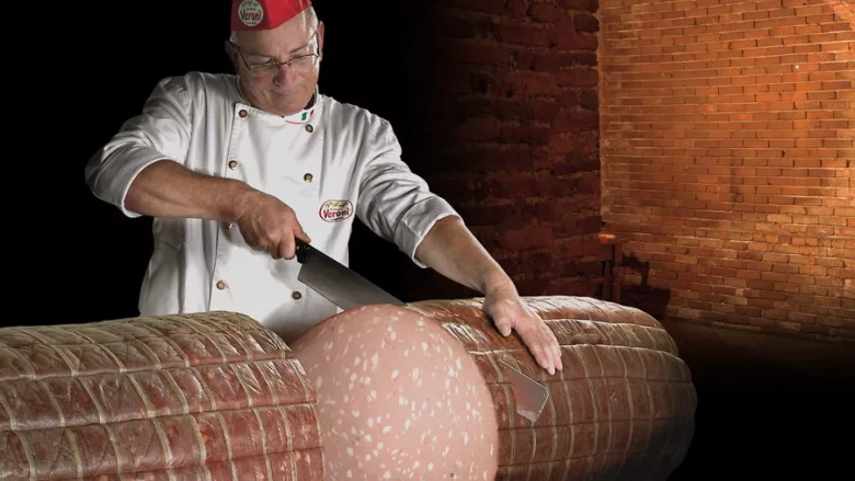 Specialist slices giant mortadella