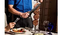 Texas de Brazil, the Brazilian Steakhouse known for its various cuts of flame-grilled meats served tableside, announces opening in Rogers, Ark. Texas de Brazil, the Brazilian Steakhouse known for its various cuts of flame-grilled meats served tableside, announces opening in Rogers, Ark.