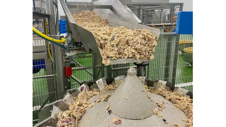 Cabinplant's Multihead Weigher with sticky product