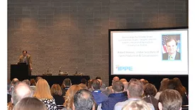 USDA Under Secretary of Farm Production and Conservation Robert Bonnie speaking to a large crowd during the Animal Agriculture Sustainability Summit at the 2023 IPPE.