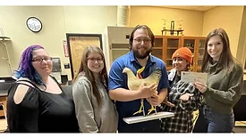 Courtney Happ (right), professor and animal science instructor, with several animal science students
