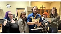 Courtney Happ (right), professor and animal science instructor, with several animal science students