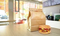Cheeseburger and craft paper bag Cheeseburger and craft paper bag