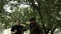 Richard Schofield, general manager for Whāngārā Farms, and Matt Harcombe, sustainability manager for Silver Fern Farms, discussing Net Carbon Zero mapping of the farm.