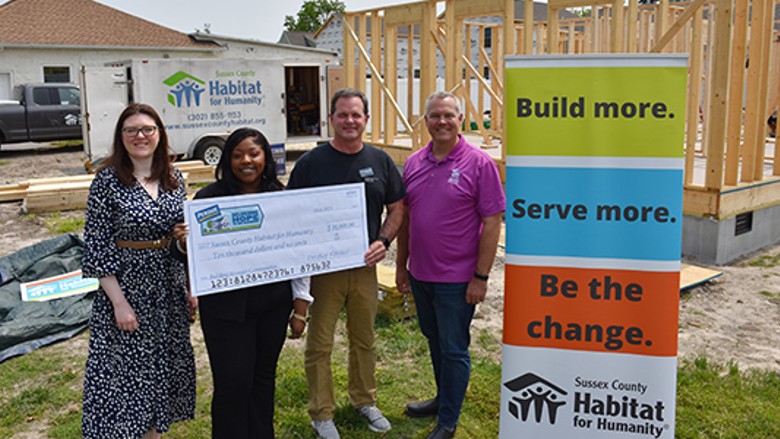 Perdue Farms delivers grant to Sussex County Habitat for Humanity
