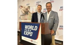 Medgene CEO Mark Luecke and Medgene National Sales Manager Andy Smythe announce recent Platform Vaccine licensure at the World Pork Expo, June 8 in Des Moines, Iowa.