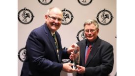 John Starkey presenting the PSA Distinguished Poultry Industry Career Award to Dr. Steven Ricke