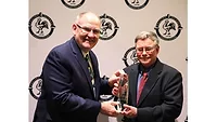 John Starkey presenting the PSA Distinguished Poultry Industry Career Award to Dr. Steven Ricke John Starkey presenting the PSA Distinguished Poultry Industry Career Award to Dr. Steven Ricke