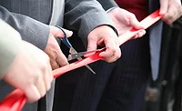Ribbon cutting at launch event