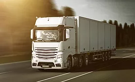 Road transport with a refrigerated trailer.