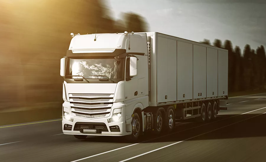 Road transport with a refrigerated trailer.