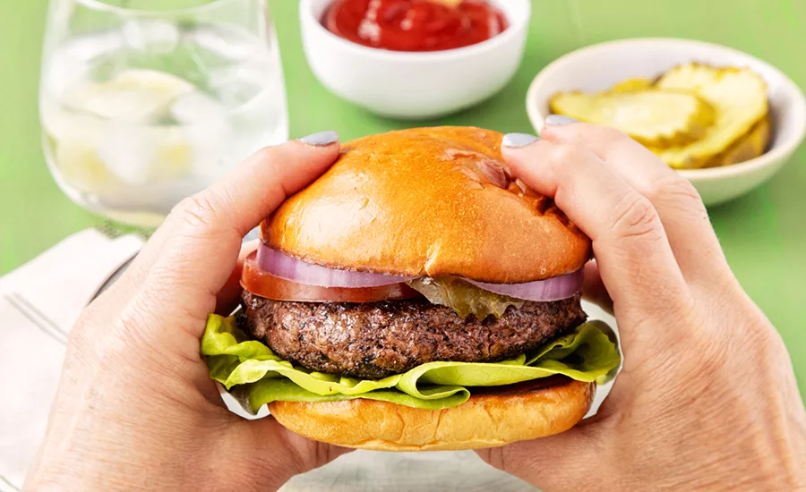 woman eating a burger