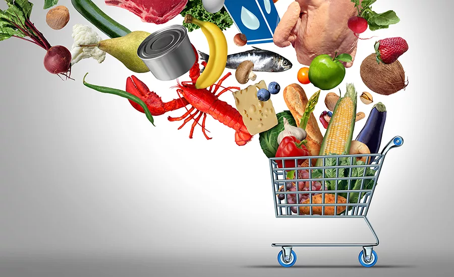 Shopping for Groceries and Grocery from a supermarket as a shop cart with milk eggs cheese meat bread fish vegetables and fruit as an icon representing consumer food purchase and family budgeting.