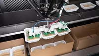 JLS Automation integrated patty packaging system JLS Automation integrated patty packaging system