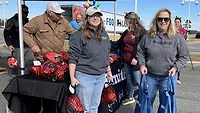 Smithfield Foods employees distribute free hams Smithfield Foods employees distribute free hams