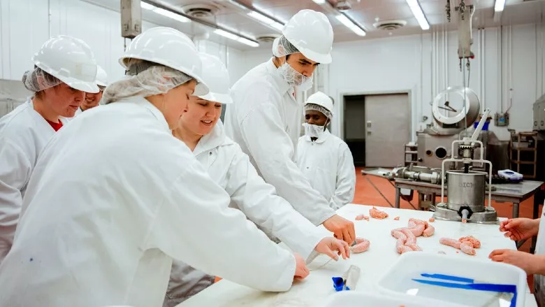 Students in the UNL Meat Science Club participate in a Sausage Making 101 course in the Animal Science Complex in February 2022.
