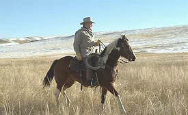 man riding a horse