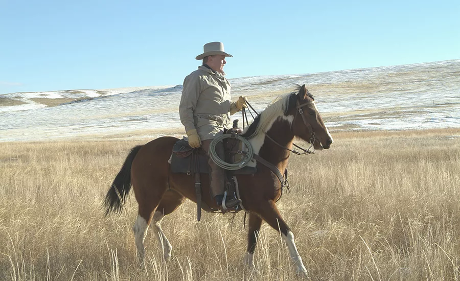man riding a horse