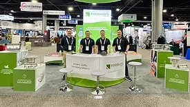 FoodSafe Drains team showcases the company's sanitary drainage solutions.