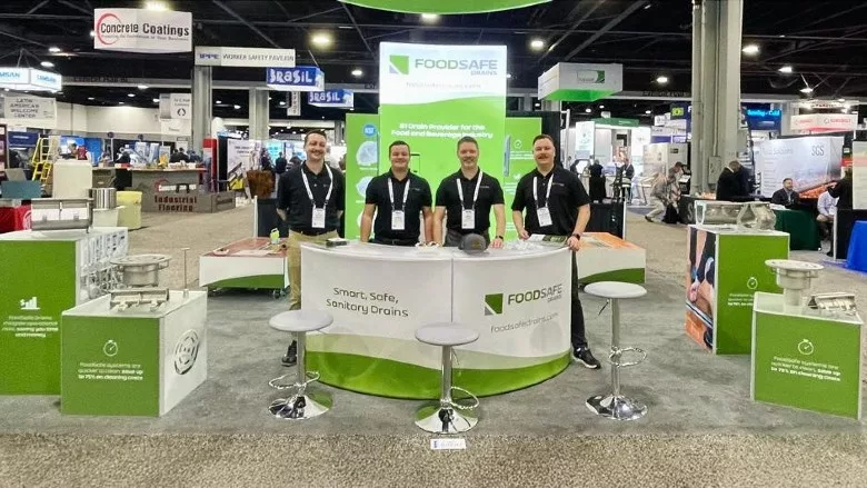 FoodSafe Drains team showcases the company's sanitary drainage solutions.