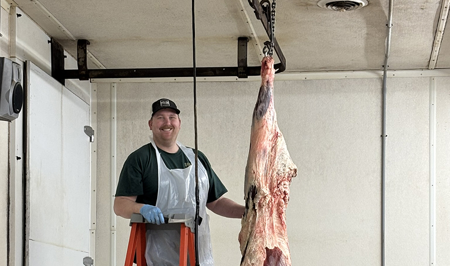 Seth Shreve, a man who appears to be involved in meat processing or butchery
