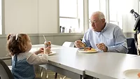 Louis Eni, CEO of Dietz & Watson, shares lunch with his granddaughter