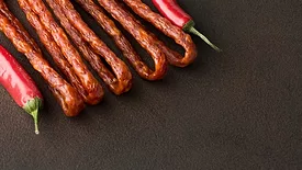Chili peppers with pork sausages