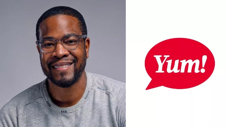Sean Tresvant headshot with Yum Brands logo