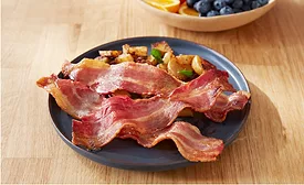 plate of bacon and potatoes