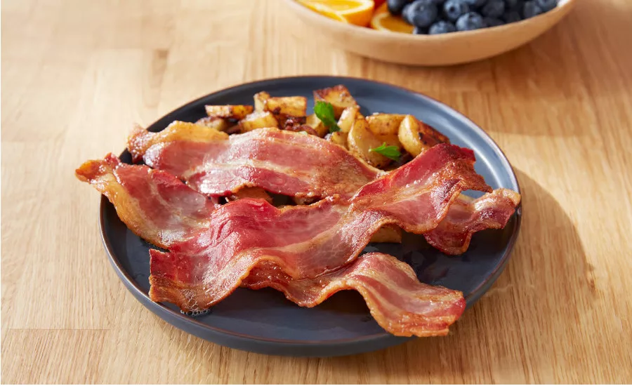 plate of bacon and potatoes