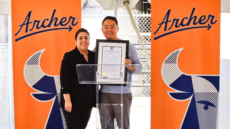 Vernon Mayor Leticia Lopez presents Archer Founder and CEO Eugene Kang with a proclamation to commemorate the grand opening of the Archer manufacturing facility