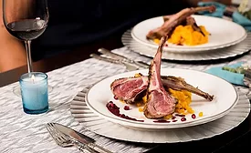 The image shows a rack of lamb, a cut of lamb that includes the ribs.