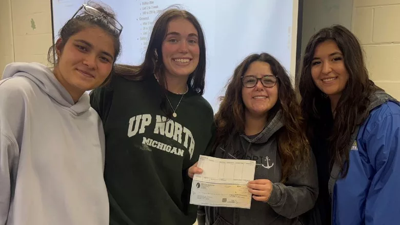 University of Delaware students with the USPOULTRY Foundation grant check