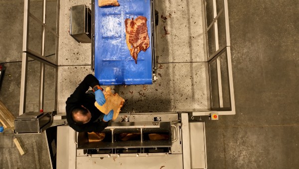 PFI pork belly slicer loading
