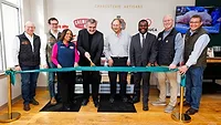 Charcuterie Artisans executives and local elected officials pose as the ribbon is cut to open the innovation center. Charcuterie Artisans executives and local elected officials pose as the ribbon is cut to open the innovation center.