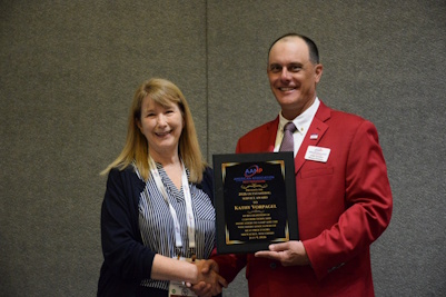 Kathy Vorpagel receives the AAMP Outstanding Service Award