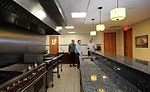 Gerald Lessard, vice president and COO of West Liberty Foods, shows off the culinary kitchen purchased along with the Bolingbrook facility