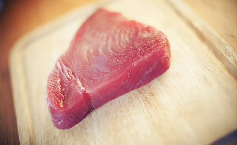 The U.S. Dietary Guidelines suggest choosing items like a salmon steak or tuna sandwich in place of meat or poultry twice each week