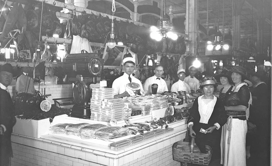 A display of cured meats in a market circa 1922
