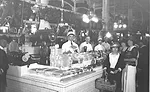 A display of cured meats in a market circa 1922