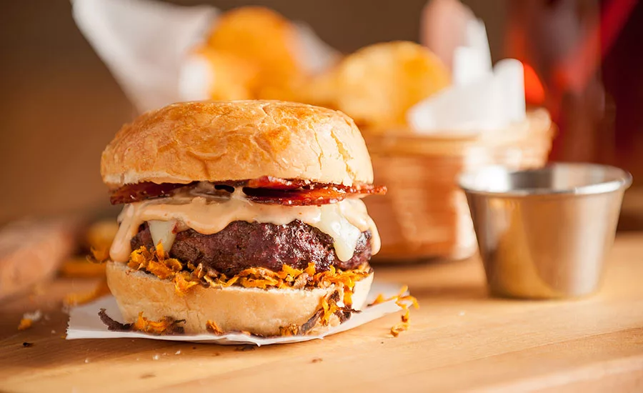 Sauces, toppings, and the bun are all being used as avenues to introduce new flavors to burgers