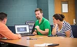 Magnus Campler and Monique Pairis-Garcia showing software their team uses to observe and record sow aggression incidents