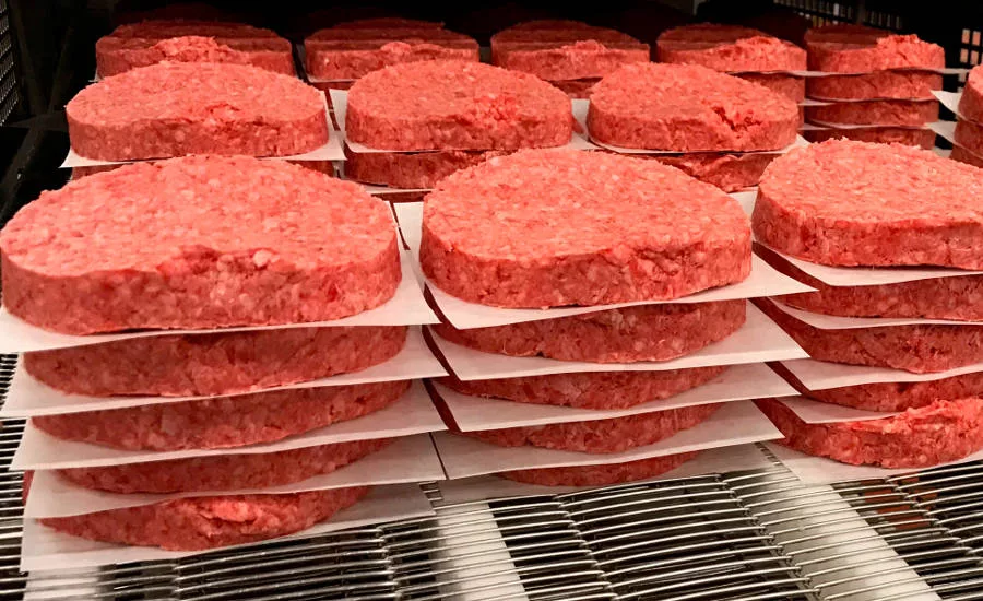 An automated grinding line allows Schweid & Sons to produce customized blends for its customers