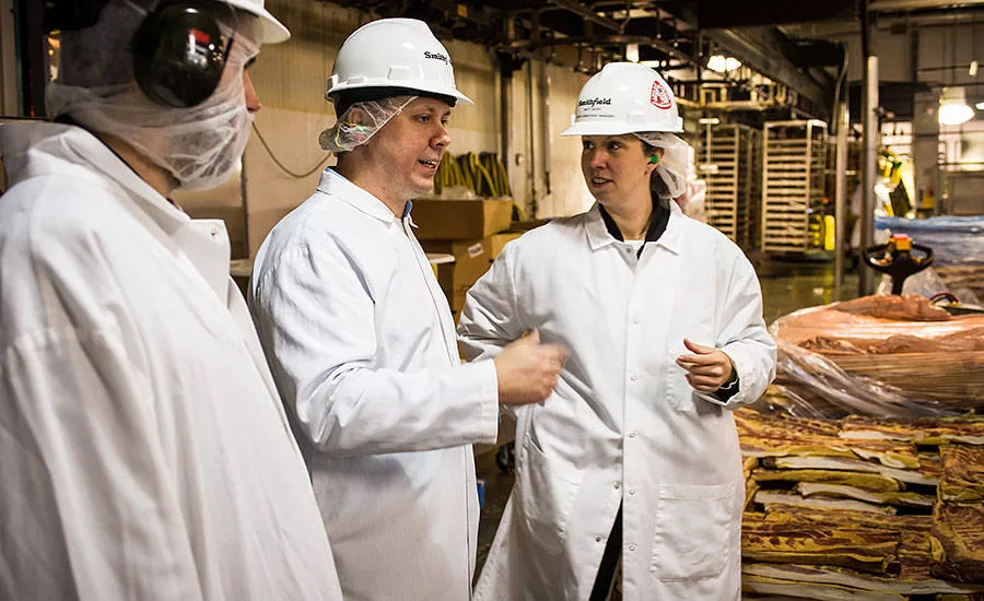Brittany Scopa, operations manager, and Brandon Speight, food safety manager, of Smithfield Foods