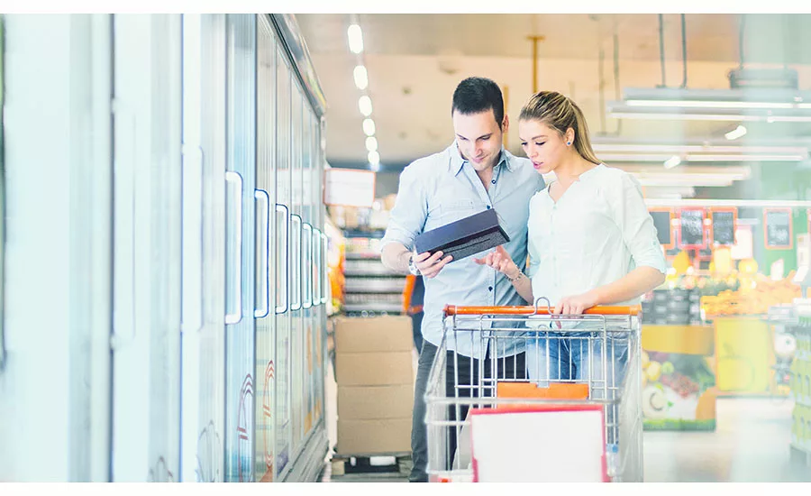 Couple reading nutrition facts label