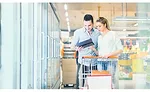 Couple reading nutrition facts label