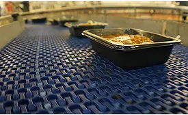 Conveyor with food packages